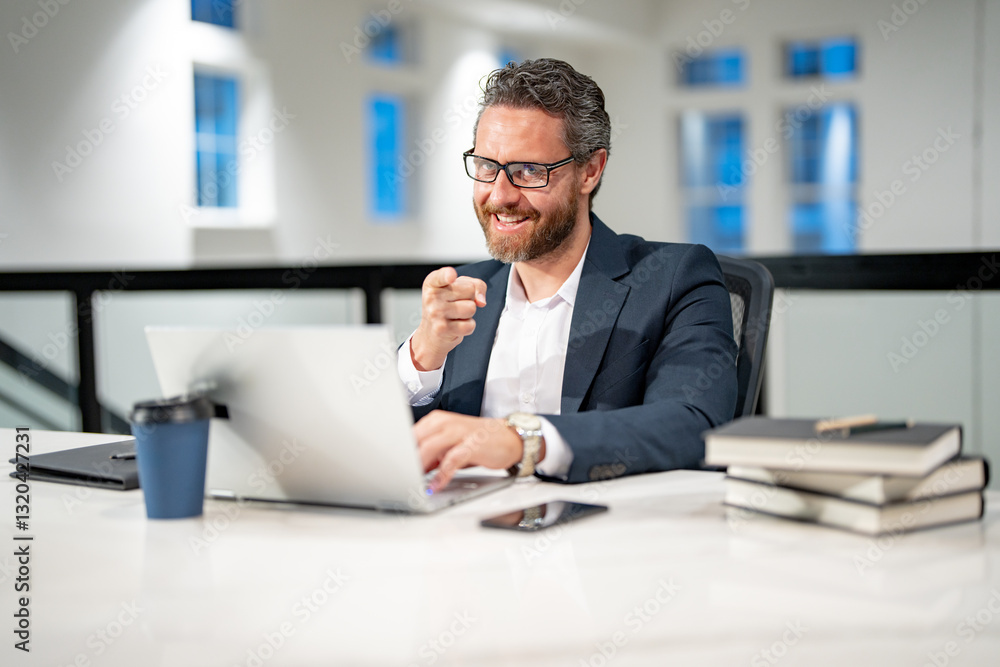 Office workplace. Handsome business man working with laptop at desk in office. Businessman typing on keyboard, online business meeting. Businessman working in office. Office worker using laptop. Office workplace. Handsome business man working with laptop at desk in office. Businessman typing on keyboard, online business meeting. Businessman working in office. Office worker using laptop.