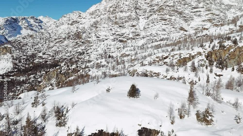 Wallpaper Mural Snowy mountains on sunny day, winter landscape, Campagneda in Valmalenco, Italian Alps. Aerial tilt-down forward Torontodigital.ca
