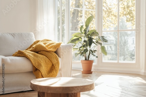 bright scandinavian living room bathed in golden sunlight featuring light gray linen sofa round wooden coffee table