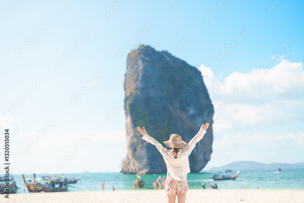 Woman tourist traveling and sightseeing in Krabi, Thailand. happy traveller enjoy on beach at Koh Poda island. summer trip, destination, Southeast Asia Travel, vacation and holiday concept Woman tourist traveling and sightseeing in Krabi, Thailand. happy traveller enjoy on beach at Koh Poda island. summer trip, destination, Southeast Asia Travel, vacation and holiday concept