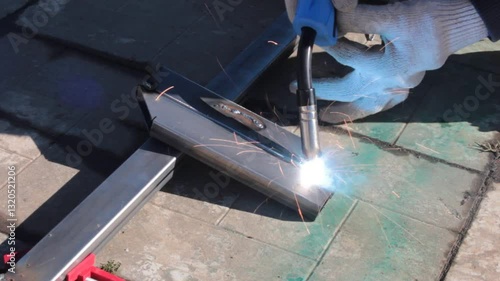 repair work with metal using a welding machine 