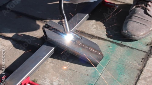 repair work with metal using a welding machine 