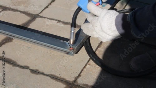 repair work with metal using a welding machine 