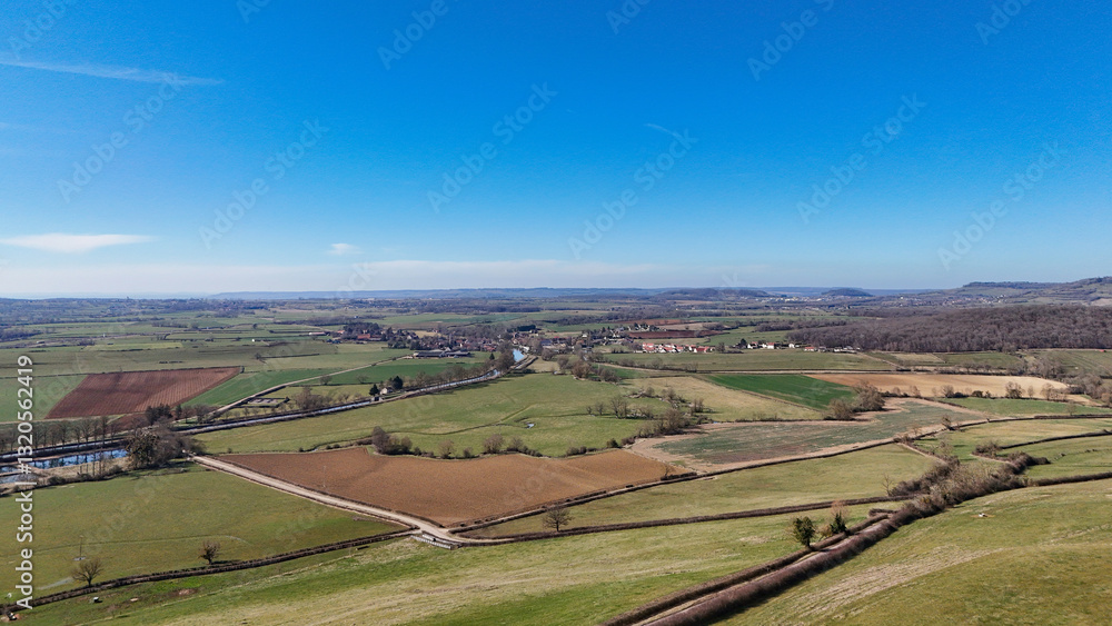 aerial view of fields with ploughed and cultivated areas aerial view of fields with ploughed and cultivated areas