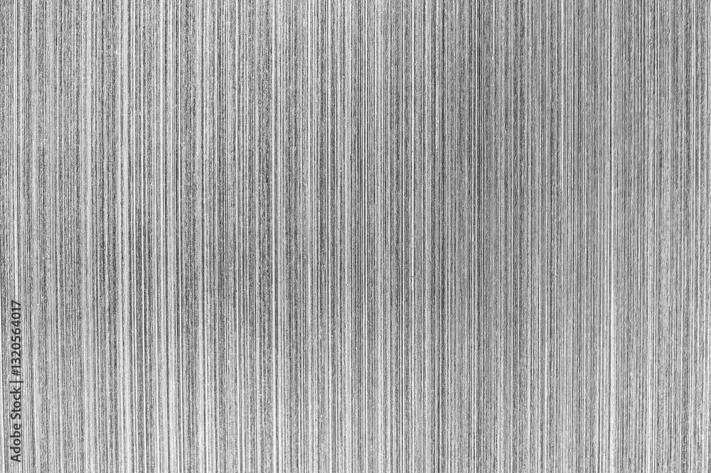 Monochrome texture of shiny scratched metal. Abstract background. Monochrome texture of shiny scratched metal. Abstract background.
