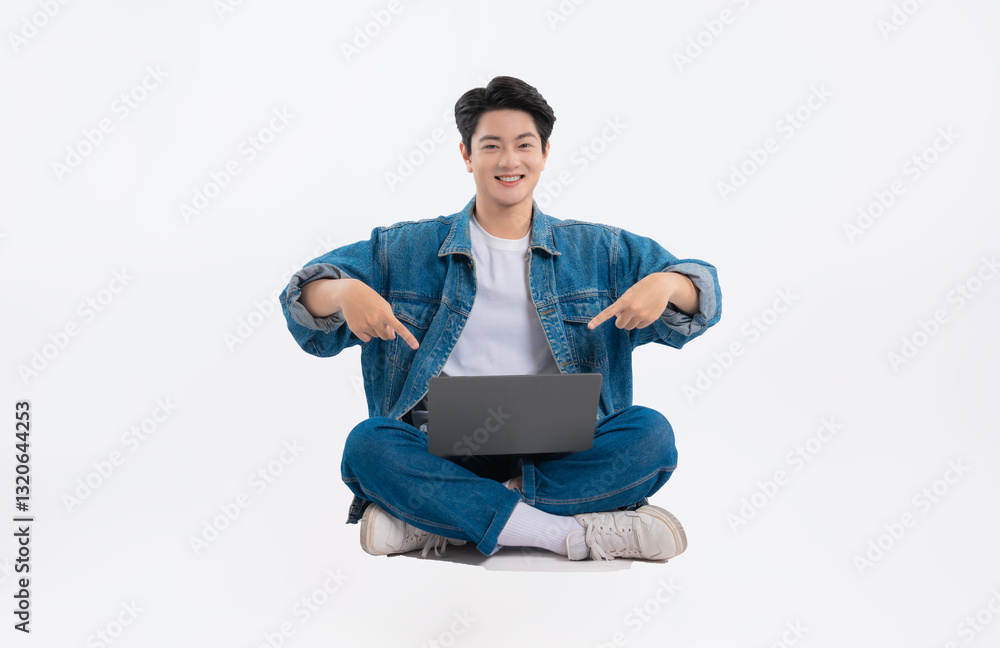 Full body image of Asian guy using laptop on white background Full body image of Asian guy using laptop on white background