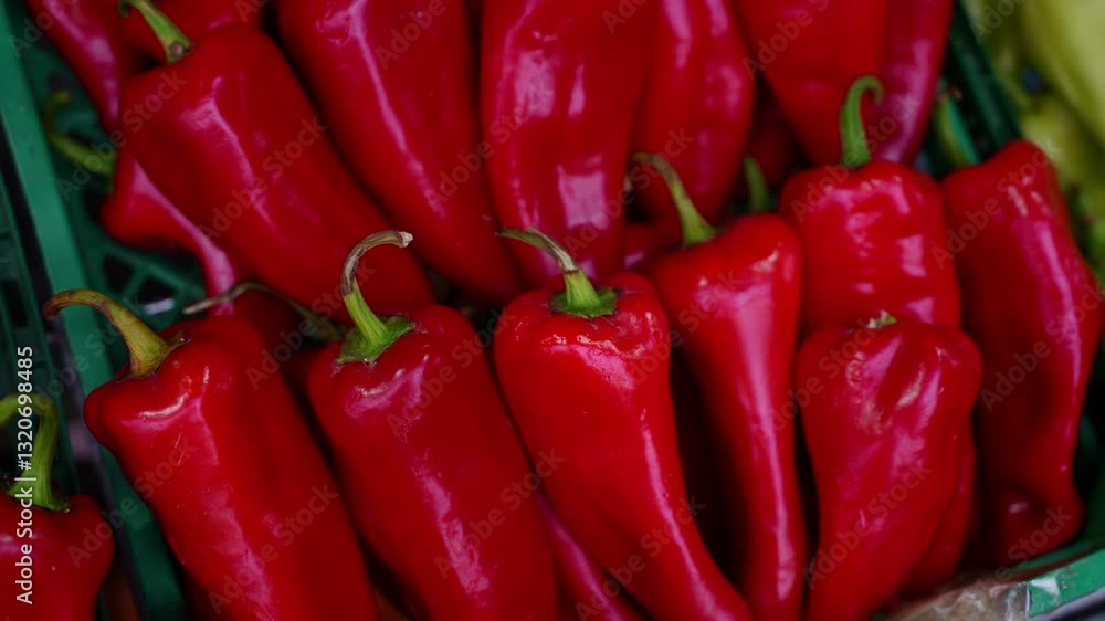 Fresh red organic peppers on counter in farm shop, close-up. Sale of natural, organic vegetables, farming, healthy food, street trading Fresh red organic peppers on counter in farm shop, close-up. Sale of natural, organic vegetables, farming, healthy food, street trading