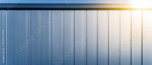 Wallpaper Mural Metal wall reflecting sunlight in outdoor space during early morning hours Torontodigital.ca