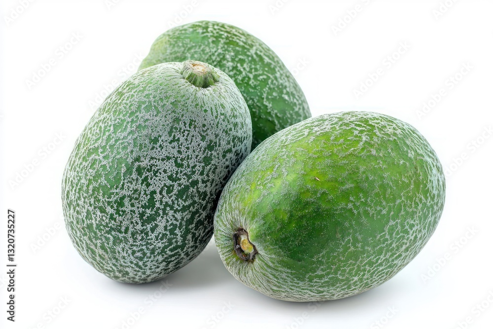 Close Up of Three Feijoa Fruits on a White Background Showing Textured Surface with Light and Shadow Close Up of Three Feijoa Fruits on a White Background Showing Textured Surface with Light and Shadow