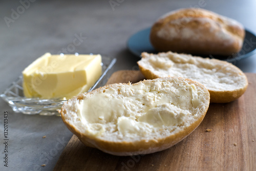 Meal preparation, bread and butter.
