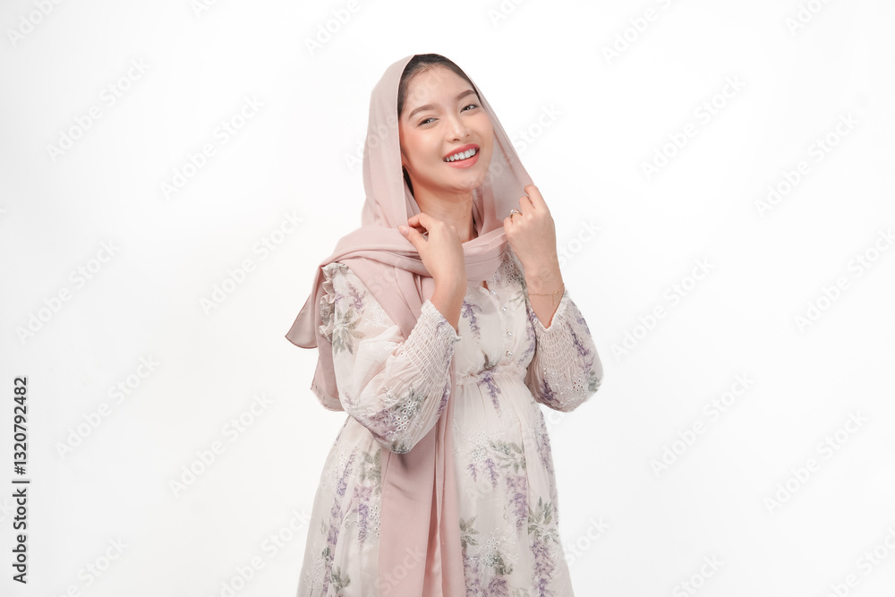 Portrait of beautiful Asian Muslim pregnant woman wearing veil hijab smiling to the camera. Portrait of beautiful Asian Muslim pregnant woman wearing veil hijab smiling to the camera.