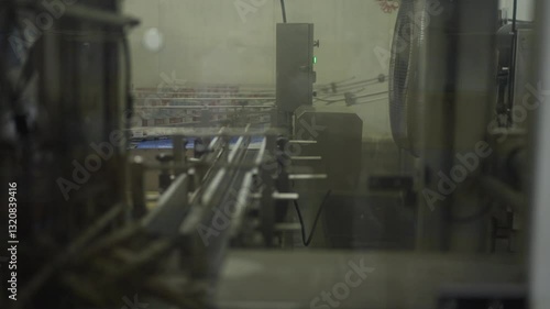 Wallpaper Mural Packaging machine operating at canned food factory. Factory, technology. Torontodigital.ca