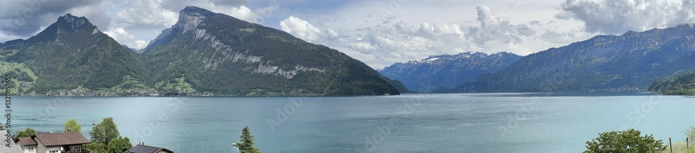 Panoramic view of lake Thunersee in the Swiss Alps mountains, Faulensee, Spiez, Bern, Switzerland, May 2024