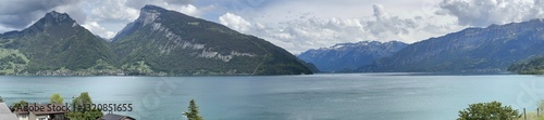 Obraz na płótnie Panoramic view of lake Thunersee in the Swiss Alps mountains, Faulensee, Spiez, Bern, Switzerland, May 2024 w salonie
