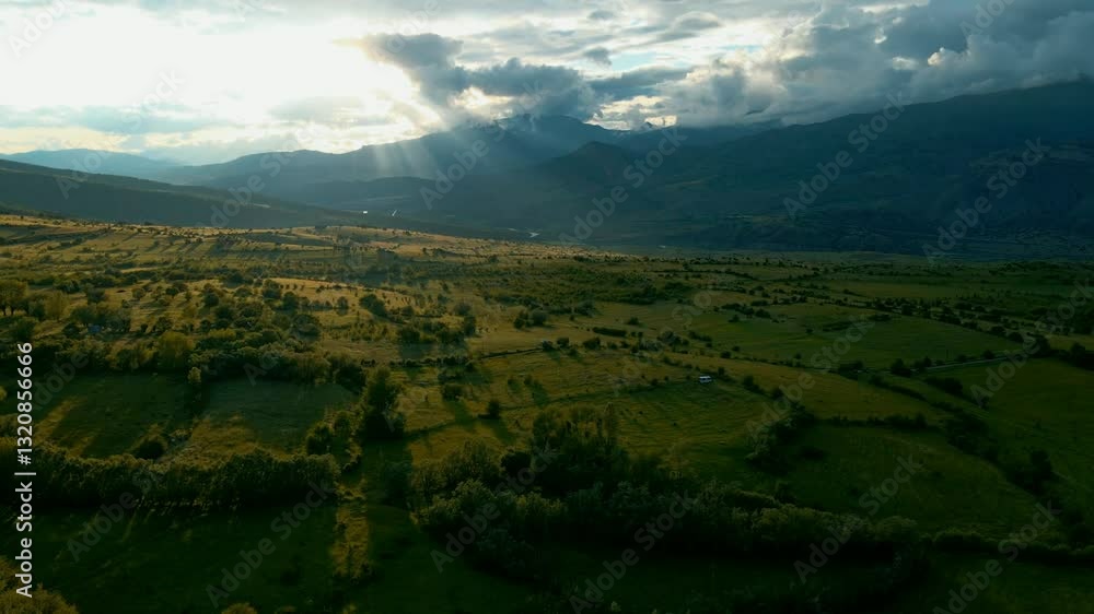 Aerial View a vast, open field with a beautiful, sunlit sky Aerial View a vast, open field with a beautiful, sunlit sky