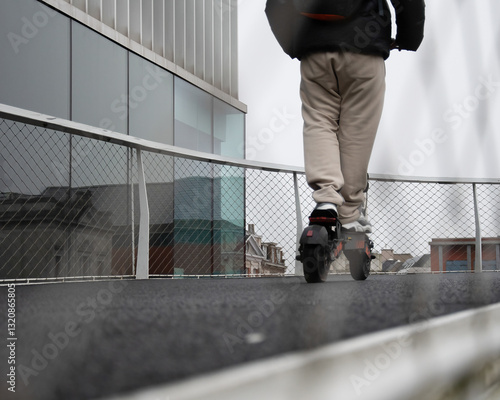 Man driving electric step on highway for bicycles