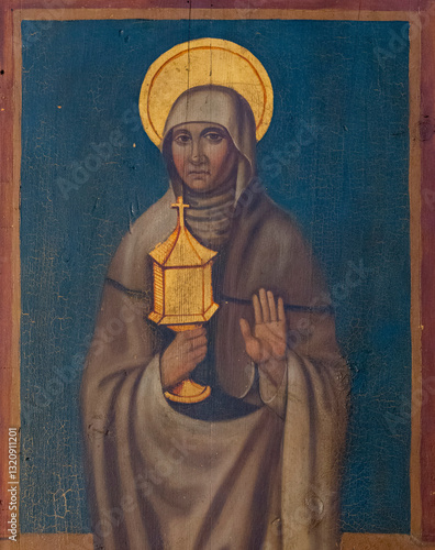 Beuil, FRANCE - 03-04-2025: Painting (19th century) of St. Clare of Assisi was one of the first disciples of Saint Francis of Assisi. She founded the Order of St. Clare.