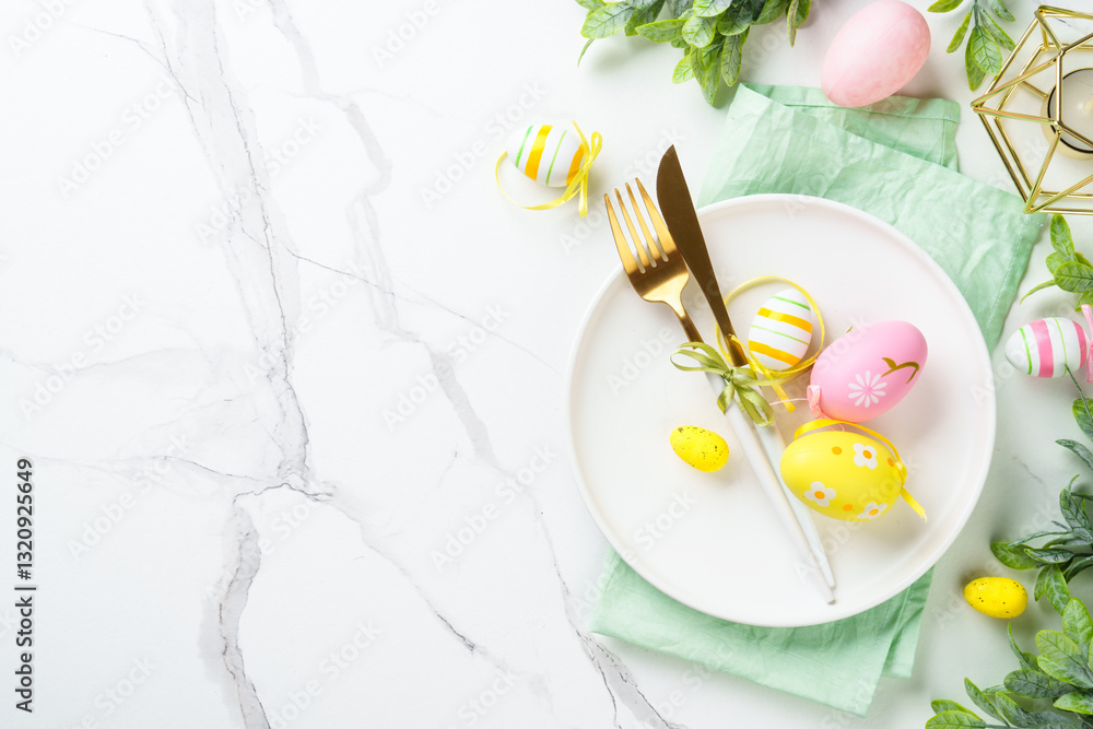 Easter table setting on white background.