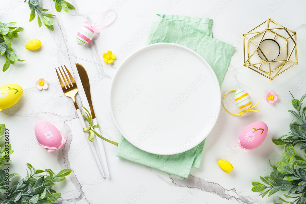 Easter table setting on white background.
