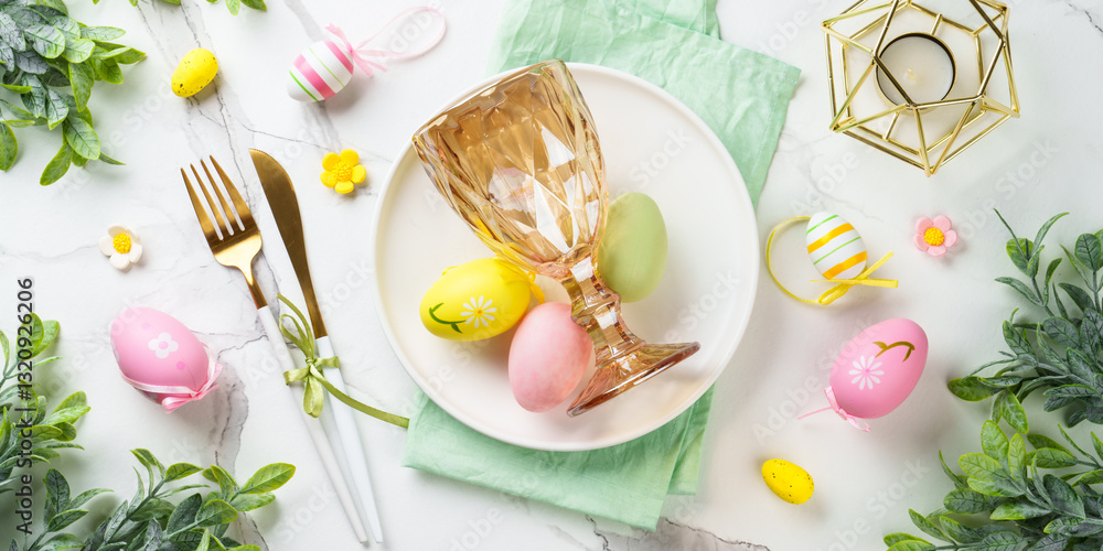 Easter table setting on white background.