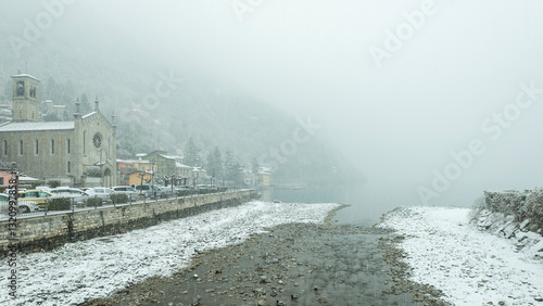 Photos snowy landscape of the village of Argegno, Como province
