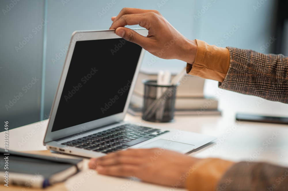 Close up picture of mans hands on the laptop Close up picture of mans hands on the laptop