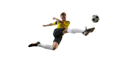 Determined man, soccer player during intensive match, kicking ball mid-air, playing isolated on white background. Concept of sport, action, competition, game, active lifestyle. Copy space