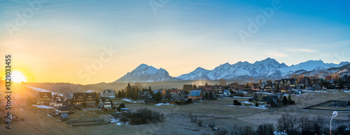 Tatra mountains at sunrise seen from Murzasichle village in Poland