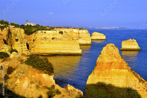 walking path with breathtaking views through the coast from porches to benagil caves lagoa algarve portugal
