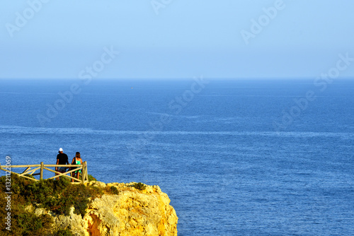 walking path with breathtaking views through the coast from porches to benagil caves lagoa algarve portugal