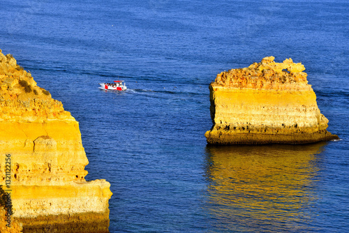 walking path with breathtaking views through the coast from porches to benagil caves lagoa algarve portugal