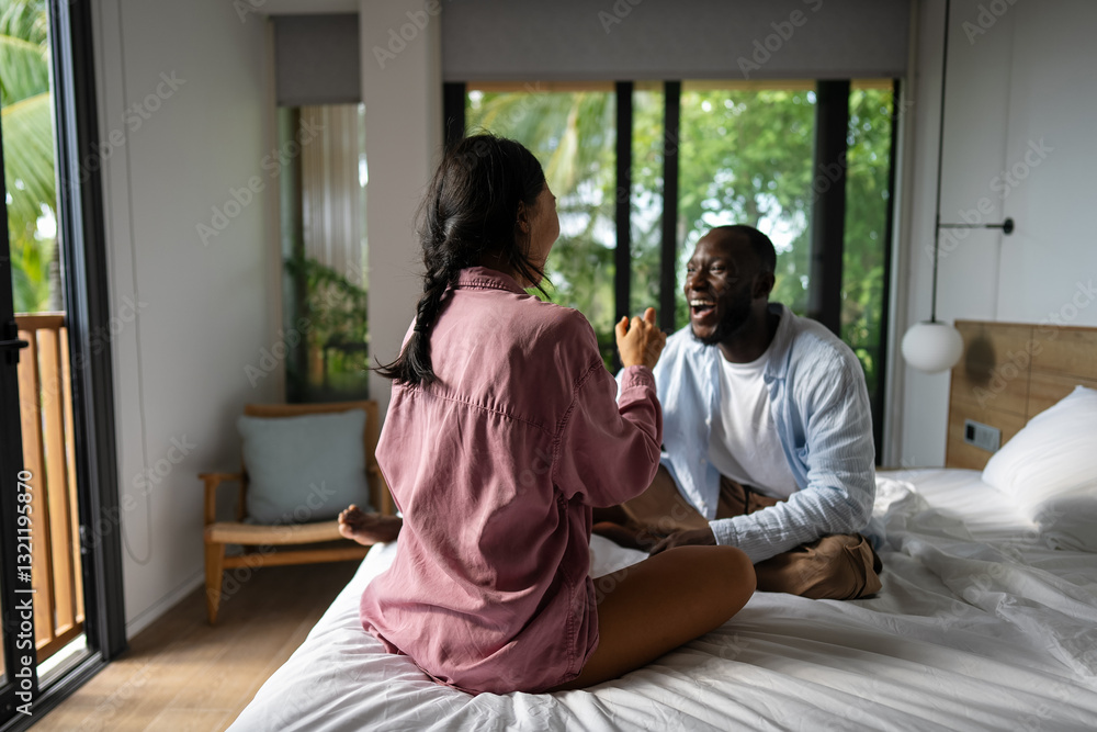 Interracial couple enjoying a joyful and intimate moment, embracing love, laughter, and togetherness Interracial couple enjoying a joyful and intimate moment, embracing love, laughter, and togetherness