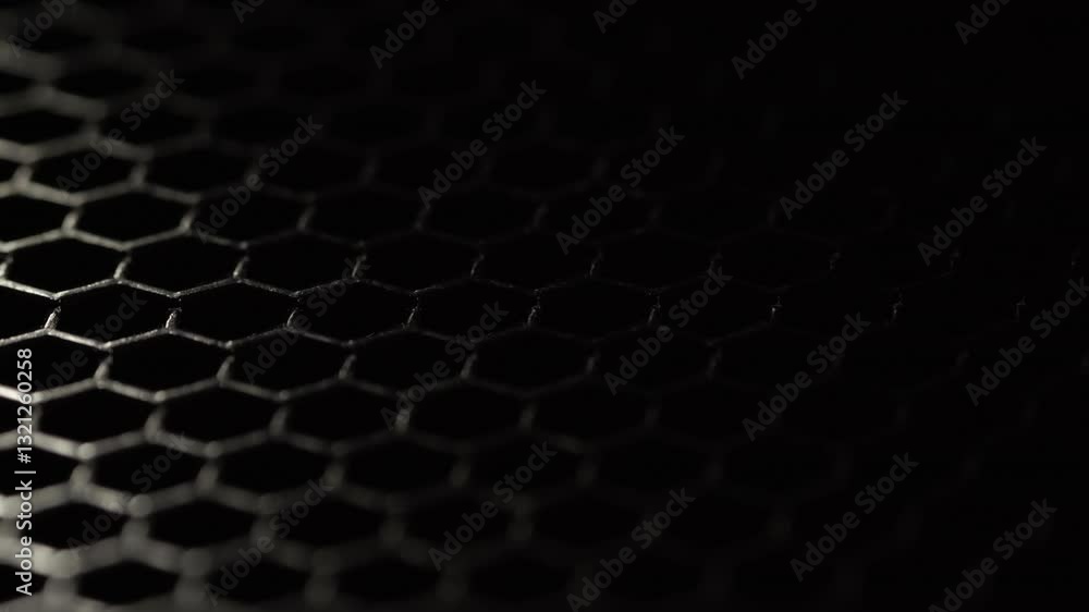 dark metallic hexagonal grid with dramatic lighting dark metallic hexagonal grid with dramatic lighting