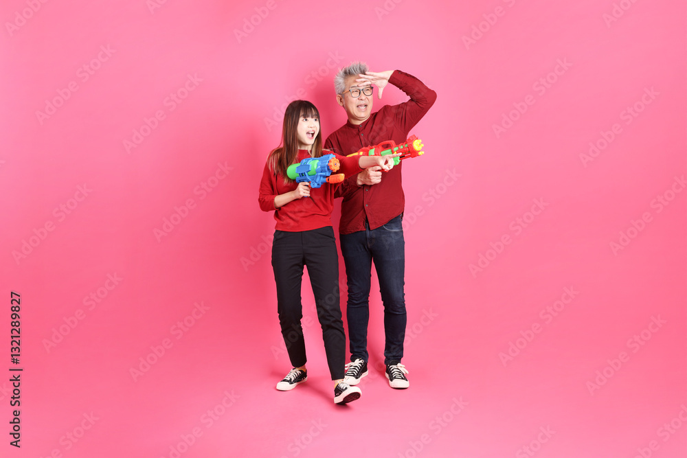 man and woman in red clothes man and woman in red clothes