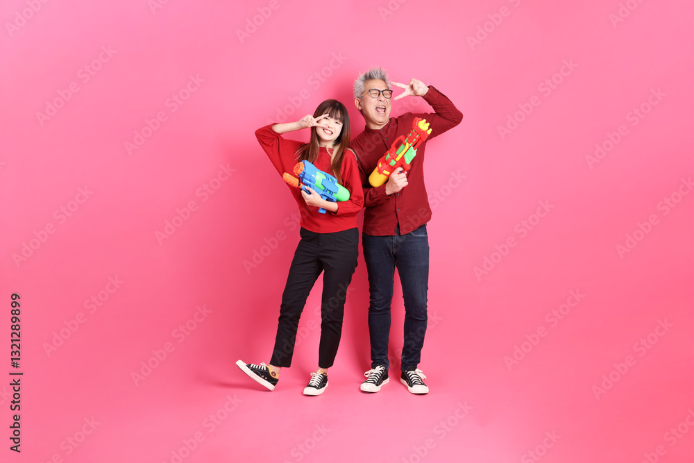 man and woman in red clothes man and woman in red clothes