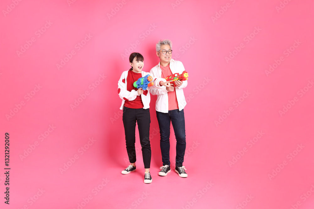 man and woman in red clothes man and woman in red clothes