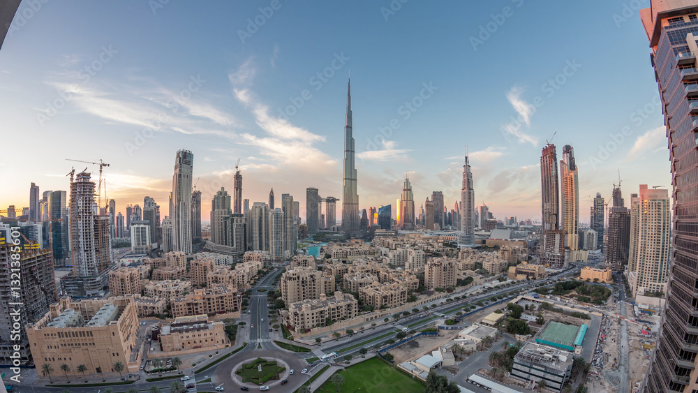 Fototapeta premium Dubai Downtown skyline day to night timelapse with Burj Khalifa and other towers panoramic view from the top in Dubai