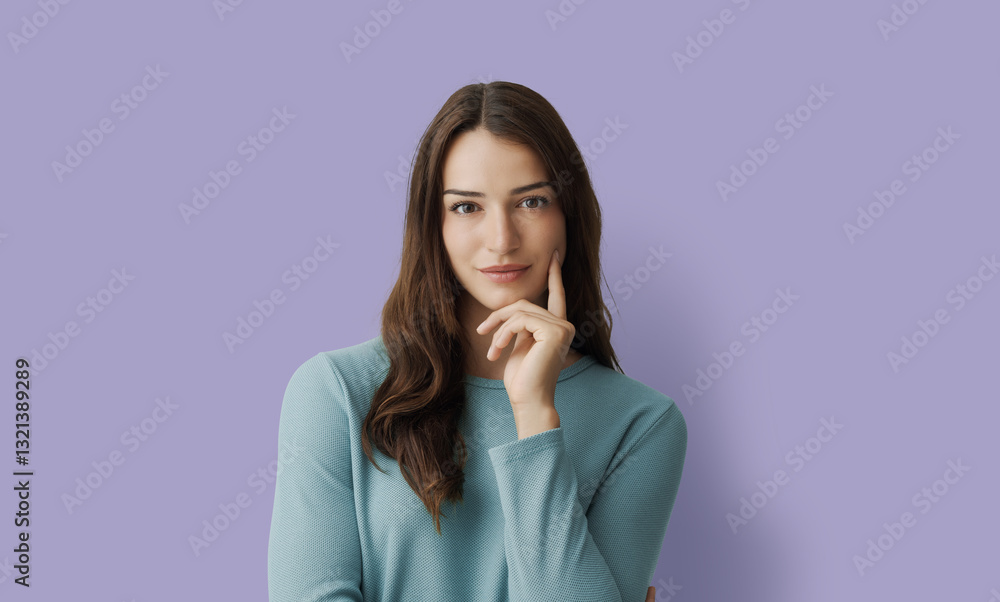 Attractive woman posing with hand on chin Attractive woman posing with hand on chin