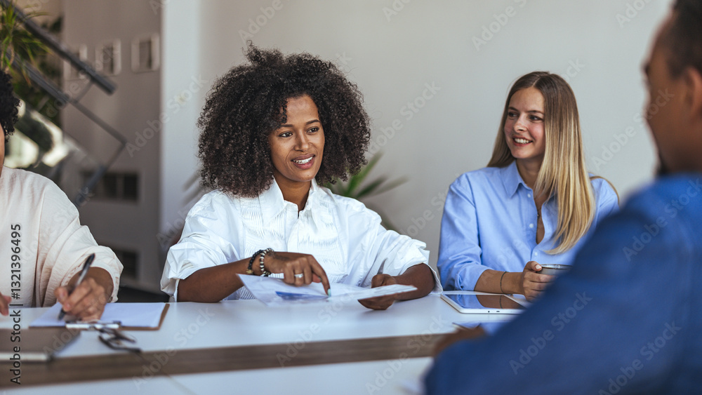 Diverse Group of Professionals Collaborating in a Modern Office Environment Diverse Group of Professionals Collaborating in a Modern Office Environment
