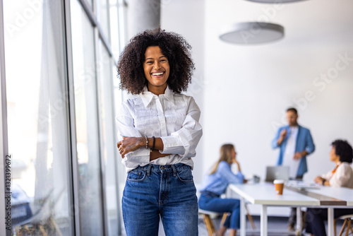 Tableau sur toile Confident Professional Woman Standing in Office During Team Meeting Discussion