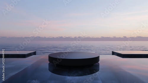 Minimalist round podium on stone overlooking deep sea
 photo