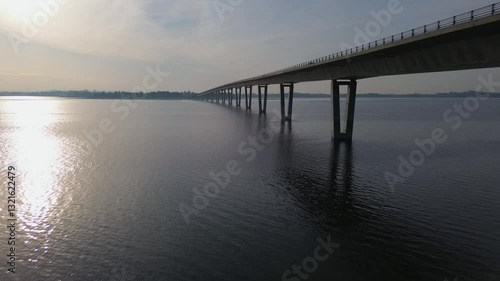 Wallpaper Mural A captivating 4K video captures a Danish bridge elegantly spanning a picturesque fjord, filmed from a bridge-level perspective. Torontodigital.ca