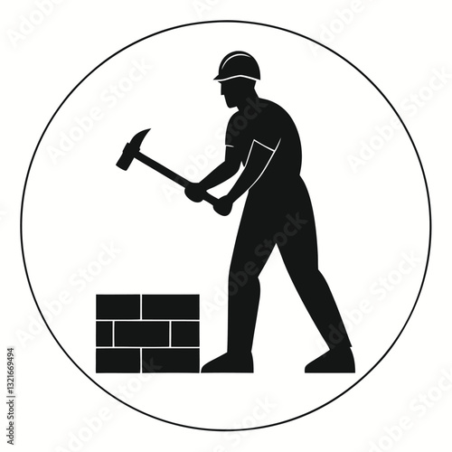 Silhouette of a Builder Breaking Stone at Worksite