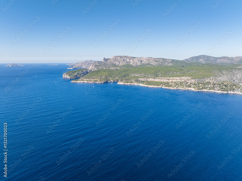 Landscape of high cliffs and blue ocean water. Cassis, France Landscape of high cliffs and blue ocean water. Cassis, France