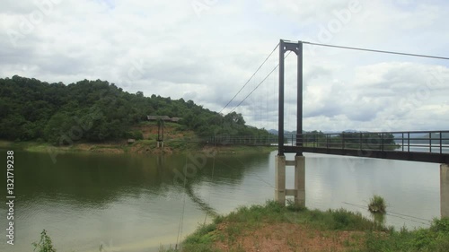 Suspension bridge across a small lake