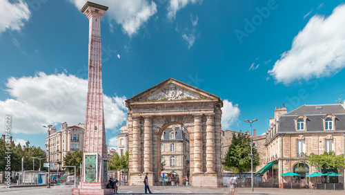 Fototapeta Naklejka Na Ścianę i Meble -  Porte d'Aquitaine arch and obelisk at Place de la Victoire timelapse hyperlapse in Bordeaux, France.