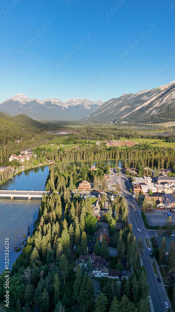 Breathtaking aerial view of Banff town nestled in a scenic mountain valley
