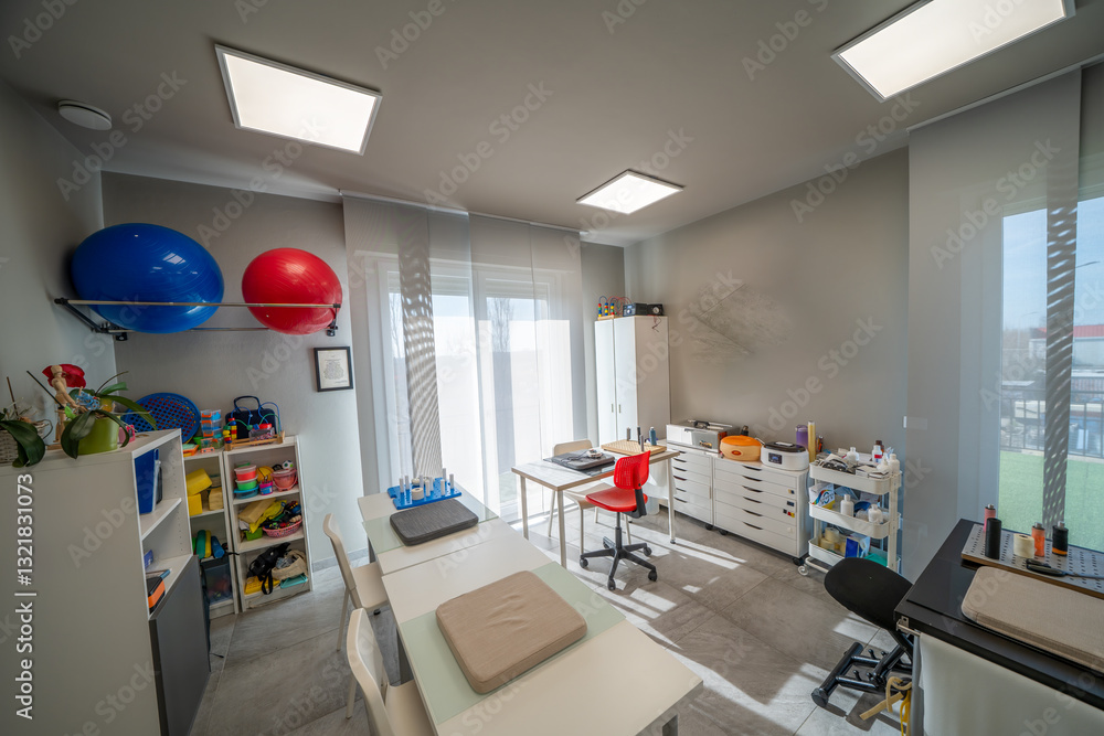 Well-equipped physiotherapy center with medical beds and advanced rehabilitation devices