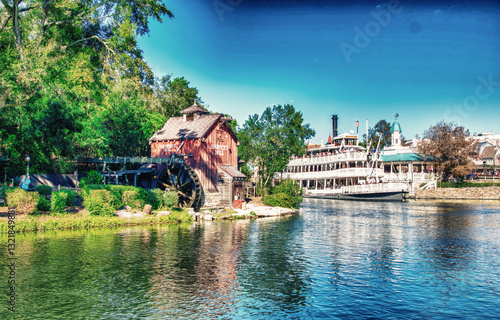 Obraz na płótnie Orlando, FL - February 18, 2016: Cruise ship along the river in the amusement park w salonie
