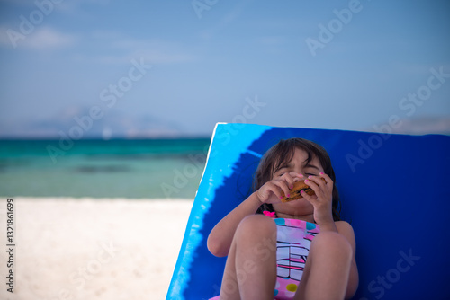 Obraz na płótnie A young girl enjoying the sandy beach in Kos, Greece with turquo w salonie